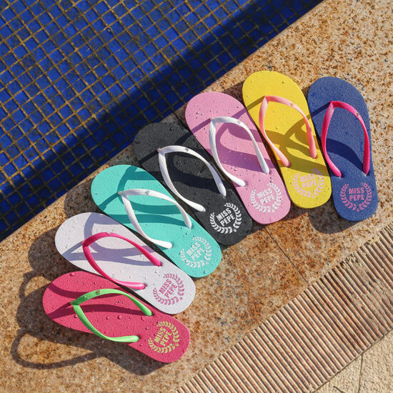 Lightweight women’s beach flip flops with red PE sole