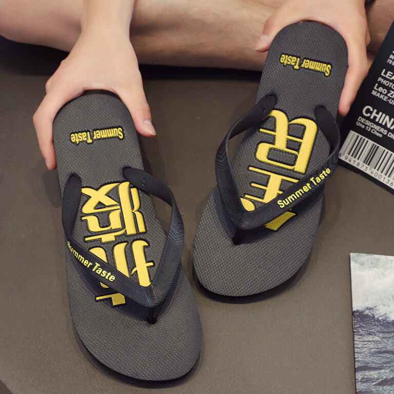 Durable men’s toe-post flip flops for summer beach or shower use
