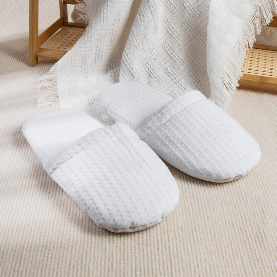 white terry hotel slippers