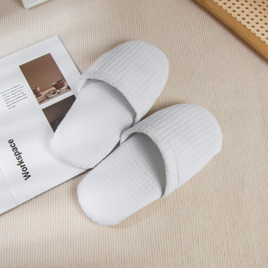 white terry hotel slippers